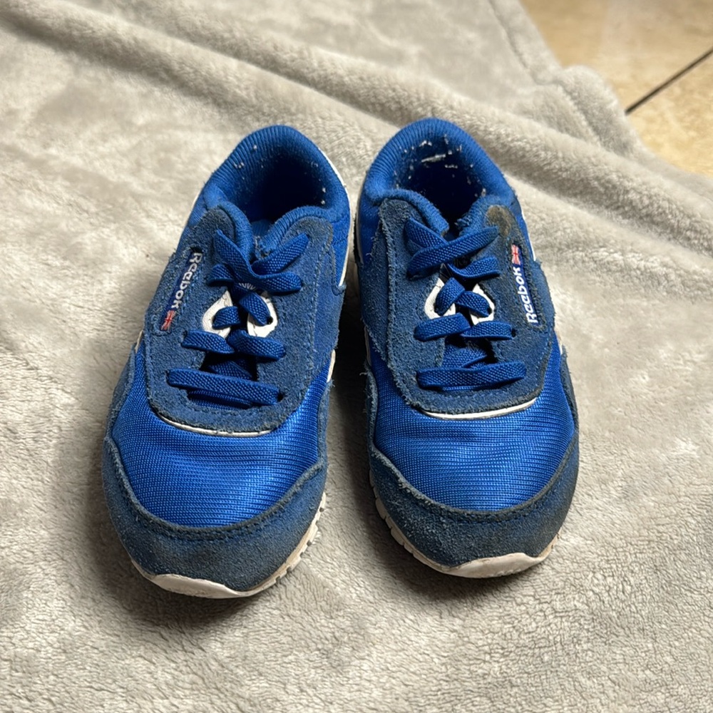 Boy blue Reebok sneakers